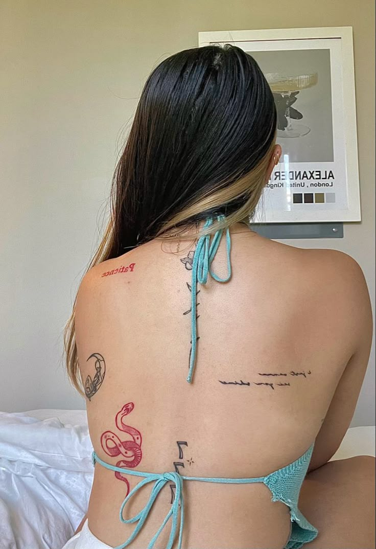 27 Spine Tattoo Ideas for Women in 2025